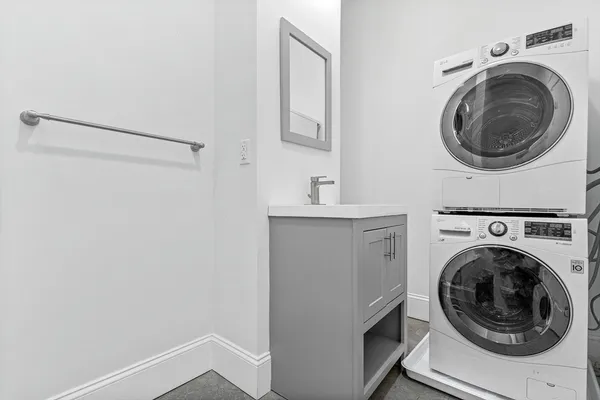 a utility room with dryer and washer
