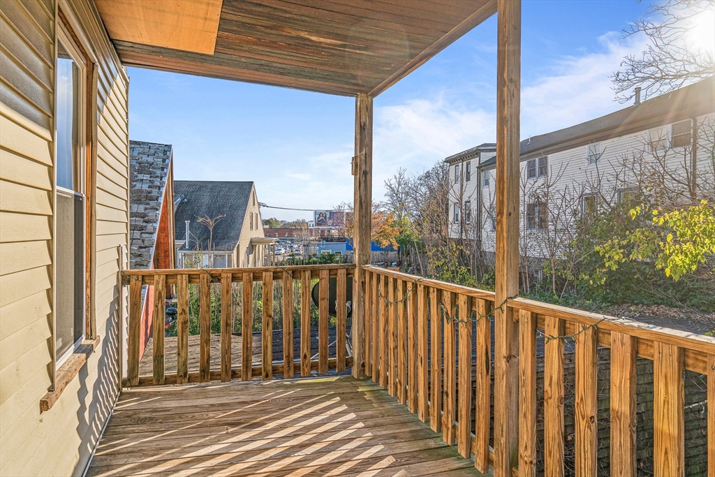 307 Hancock Street, Unit 3 Boston, MA 02125 - Photo 25 of 25 a view of a balcony with wooden floor