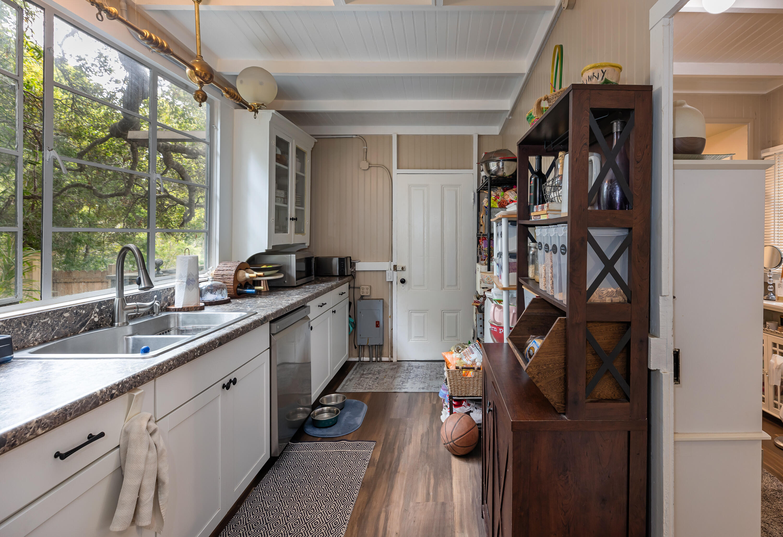 533 Brinkerhoff Avenue Santa Barbara, CA 93101 - Photo 9 of 27 a kitchen with a sink appliances cabinets and a large window