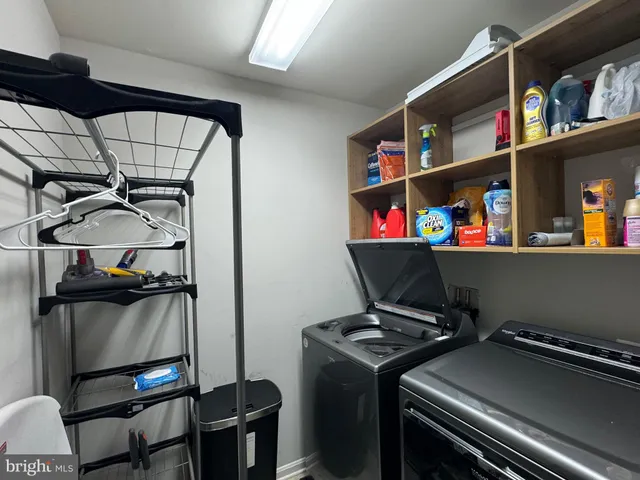 a bedroom with a bed and a walk in closet