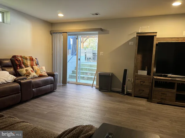 a patio with table and chairs