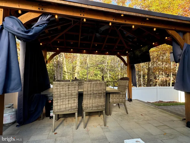 a view of a backyard of the house