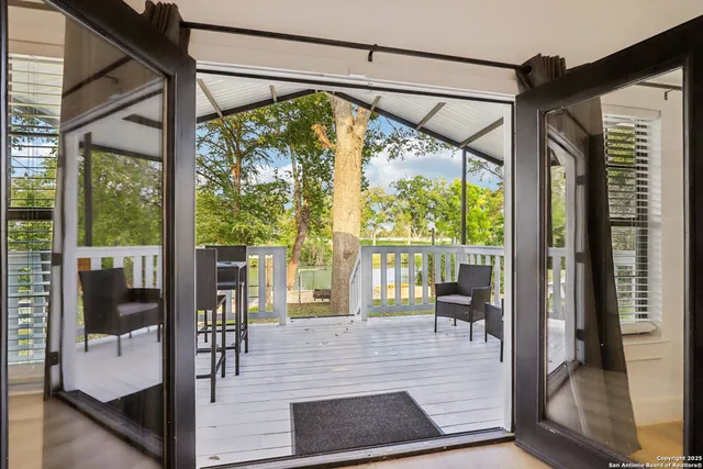 a view of a chairs on the roof deck