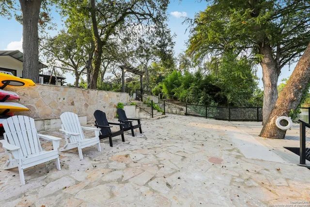 a sign board with a lake view