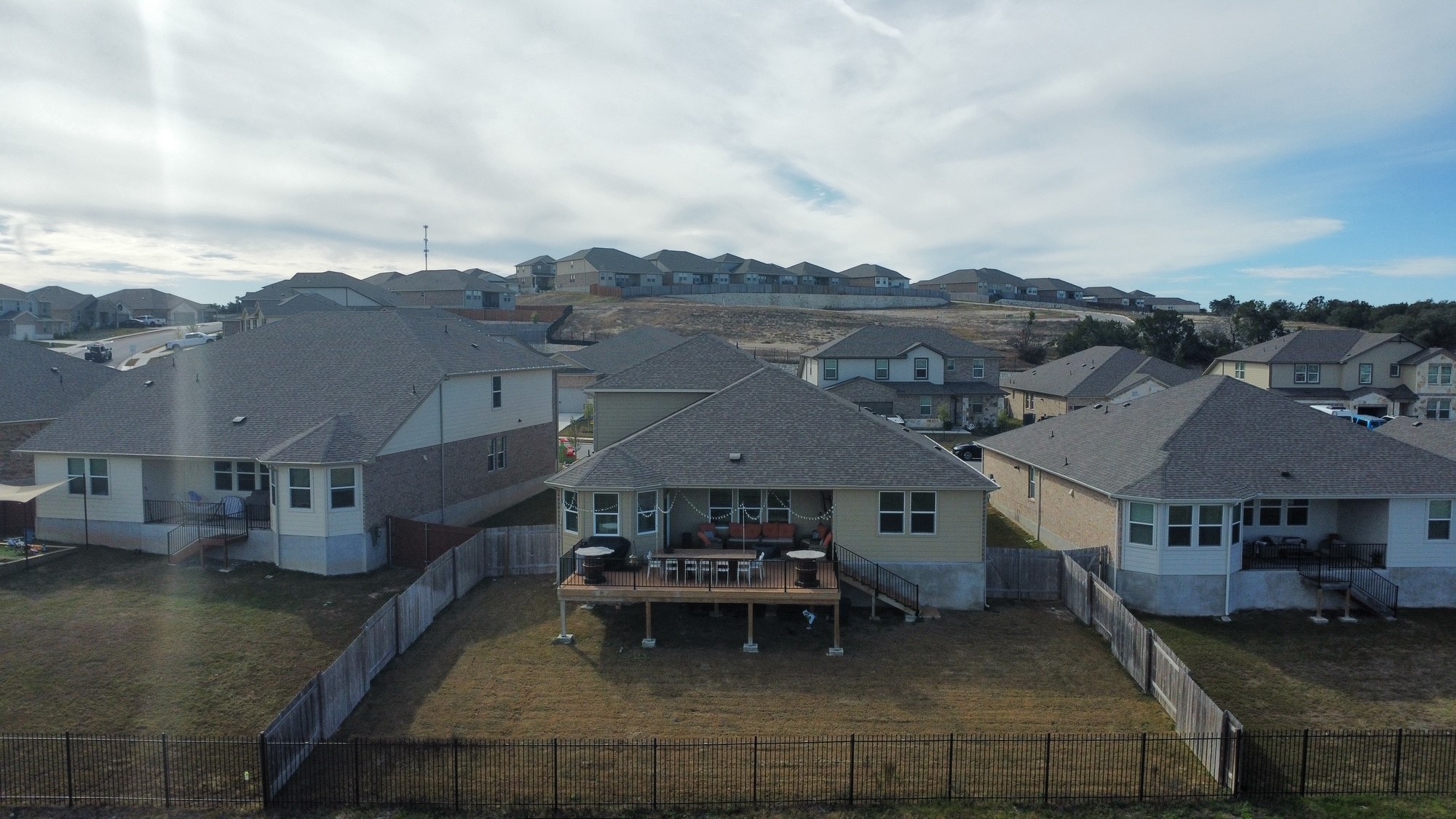 602 Sue Peaks Loop Dripping Springs, TX 78620 - Photo 14 of 39 an aerial view of a house with swimming pool and a yard