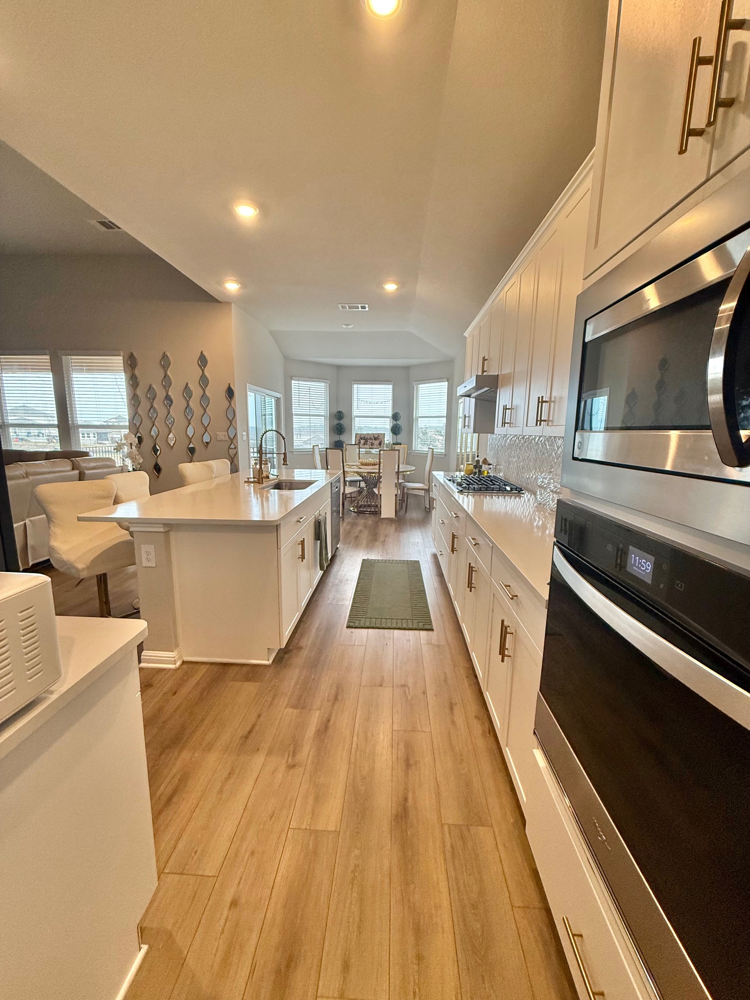 602 Sue Peaks Loop Dripping Springs, TX 78620 - Photo 21 of 39 a large kitchen with stainless steel appliances lots of counter space and a sink