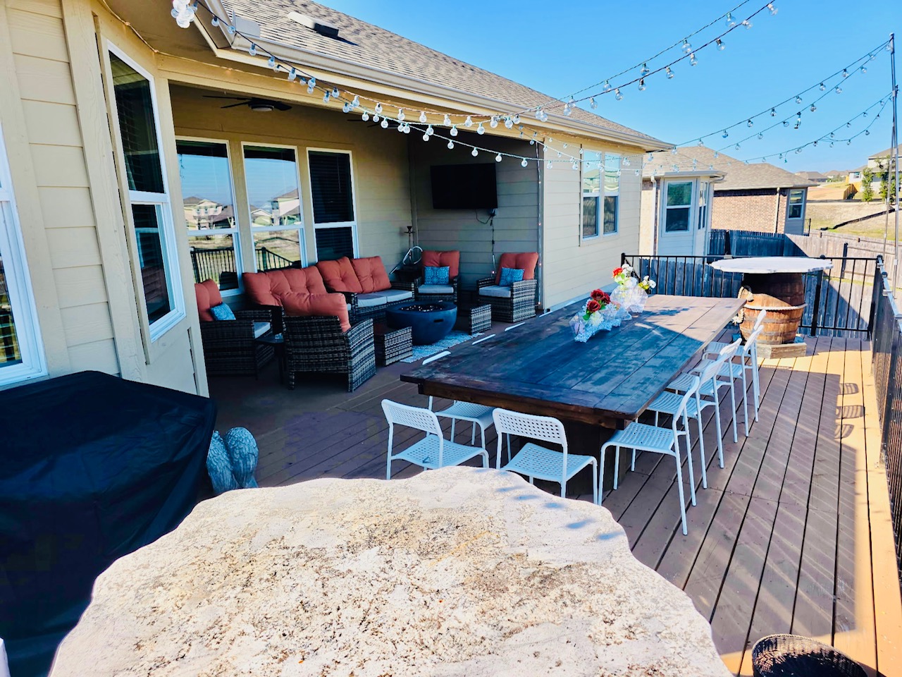 602 Sue Peaks Loop Dripping Springs, TX 78620 - Photo 35 of 39 a living room with furniture and a flat screen tv