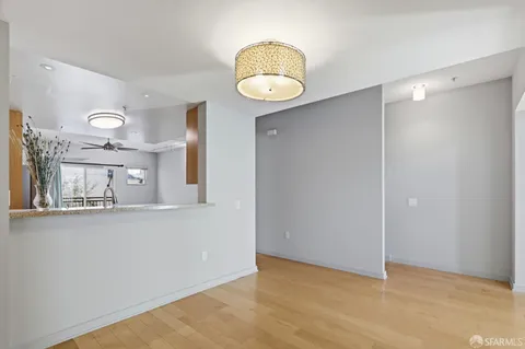 a view of a livingroom with wooden floor