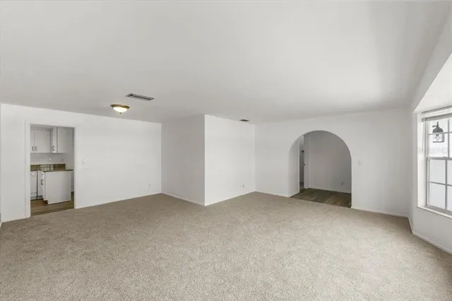 an empty room with windows