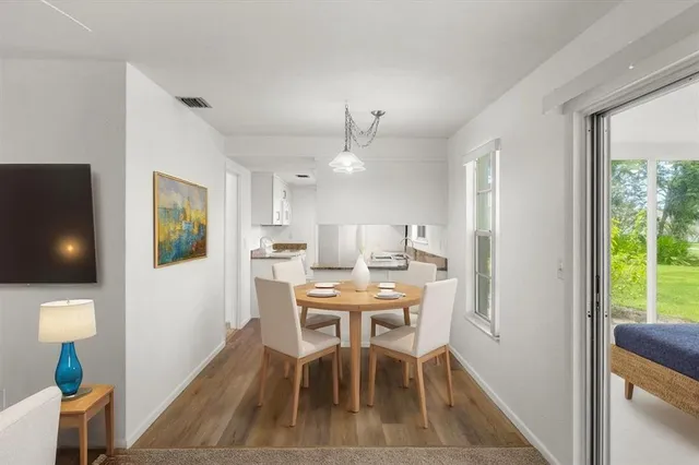 a kitchen with a sink stove and refrigerator