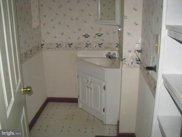 17 White Post Road White Post, VA 22663 - Photo 2 of 10 a bathroom with a sink and a shower