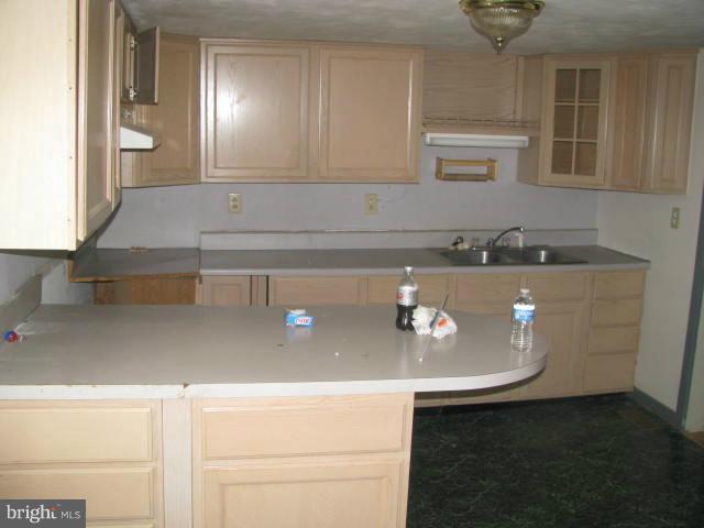 17 White Post Road White Post, VA 22663 - Photo 7 of 10 a bathroom with a sink and a stove
