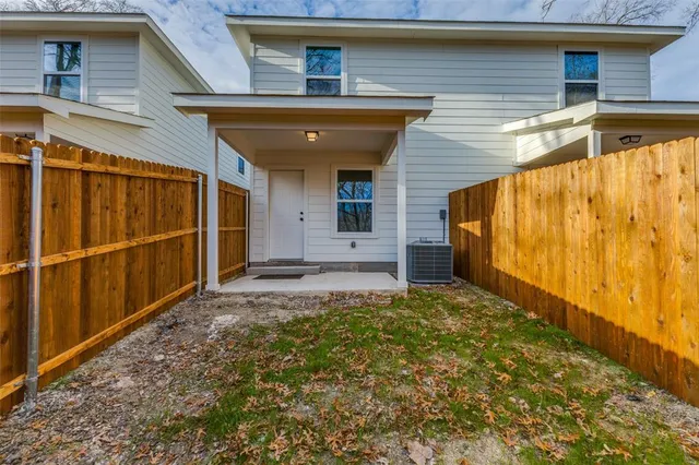 a view of backyard with cabin