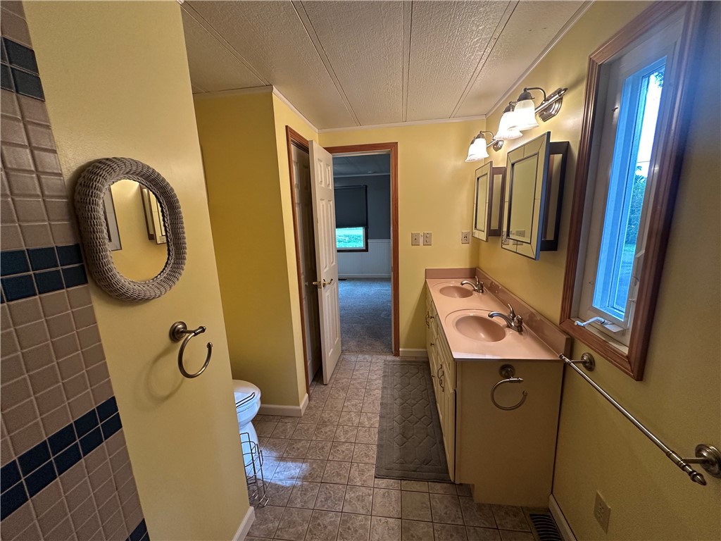 2102 Michigan Road Wayland, NY 14572 - Photo 27 of 41 full bath attached to primary bedroom