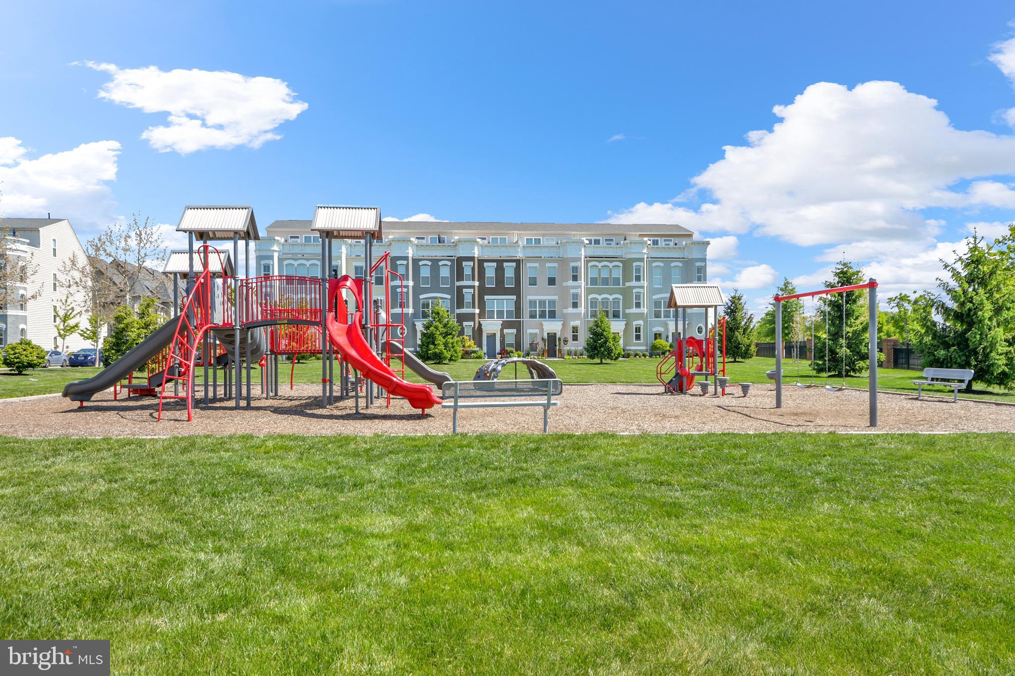 933 Holden Road Frederick, MD 21701 - Photo 66 of 80 a view of a park with swings and slides