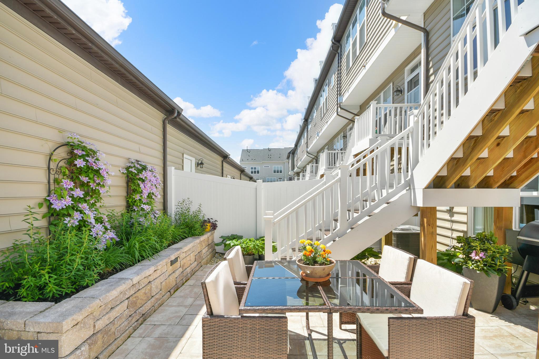 933 Holden Road Frederick, MD 21701 - Photo 10 of 80 a view of balcony with furniture and a potted plant