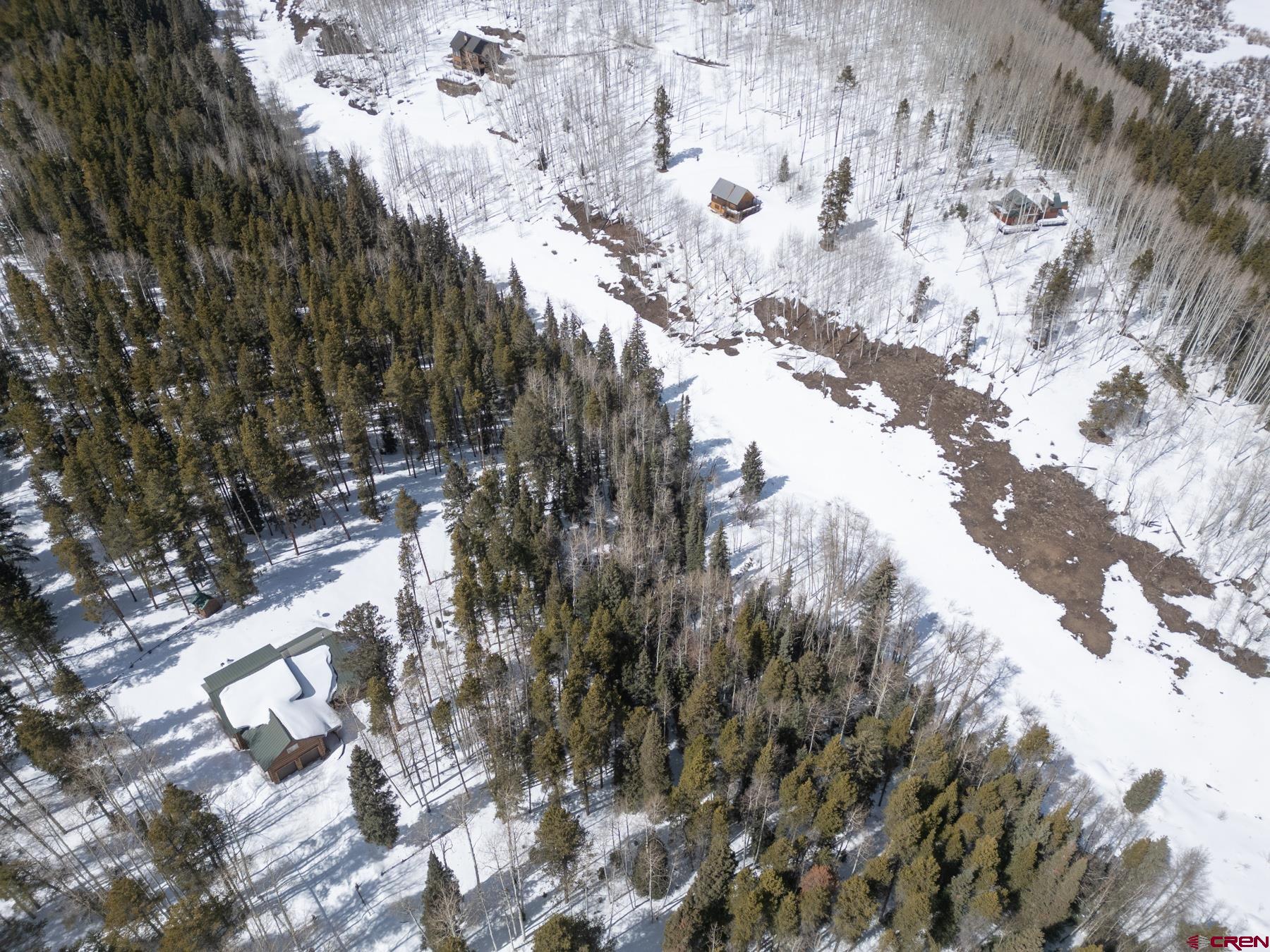 617 Sioux Road Gunnison, CO 81230 - Photo 4 of 10 a view of trees with covered in snow