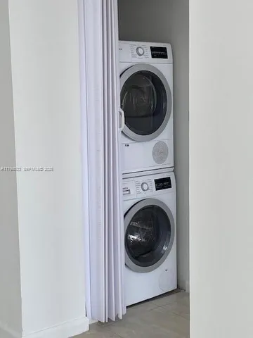 a view of a lake with boats next to a lake