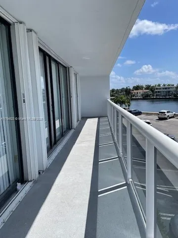 a view of a building with a street