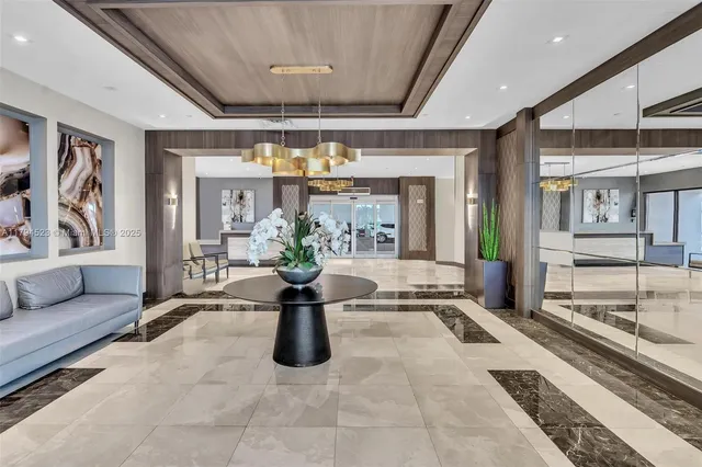 a view of living room with furniture and flat screen tv