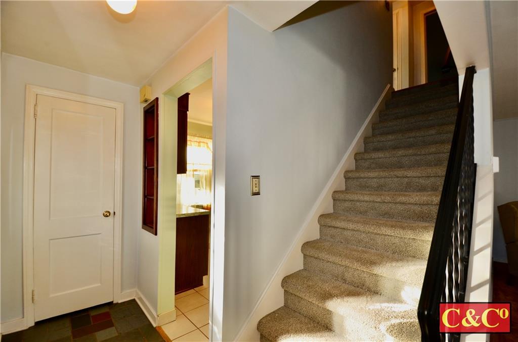 24 Wilbur Road Bergenfield, NJ 07621 - Photo 9 of 27 a view of entryway with wooden floor and stairs