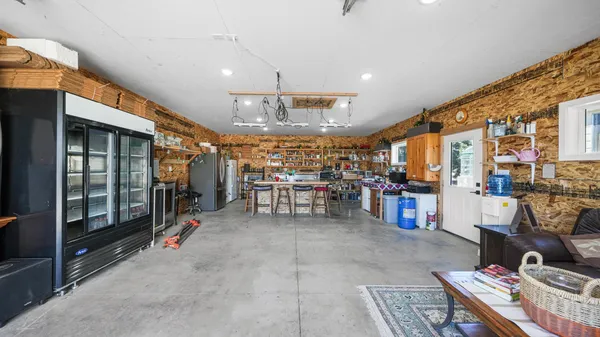 a kitchen with stove and cabinets