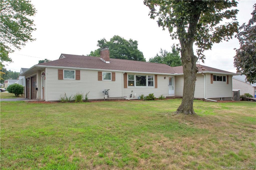 a house view with a garden space