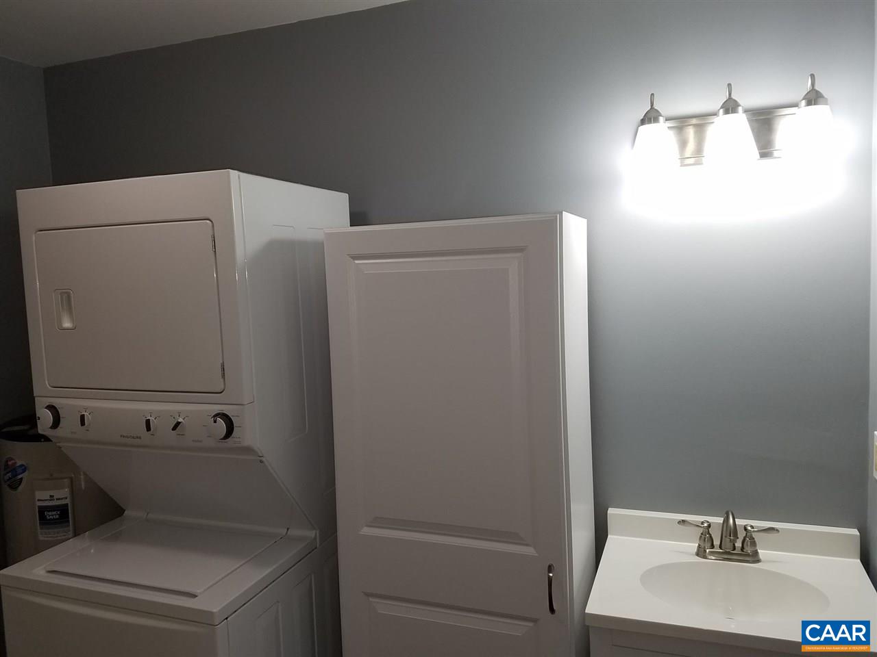 3120 Venable Road Kents Store, VA 23084 - Photo 14 of 15 a bathroom with a sink and vanity