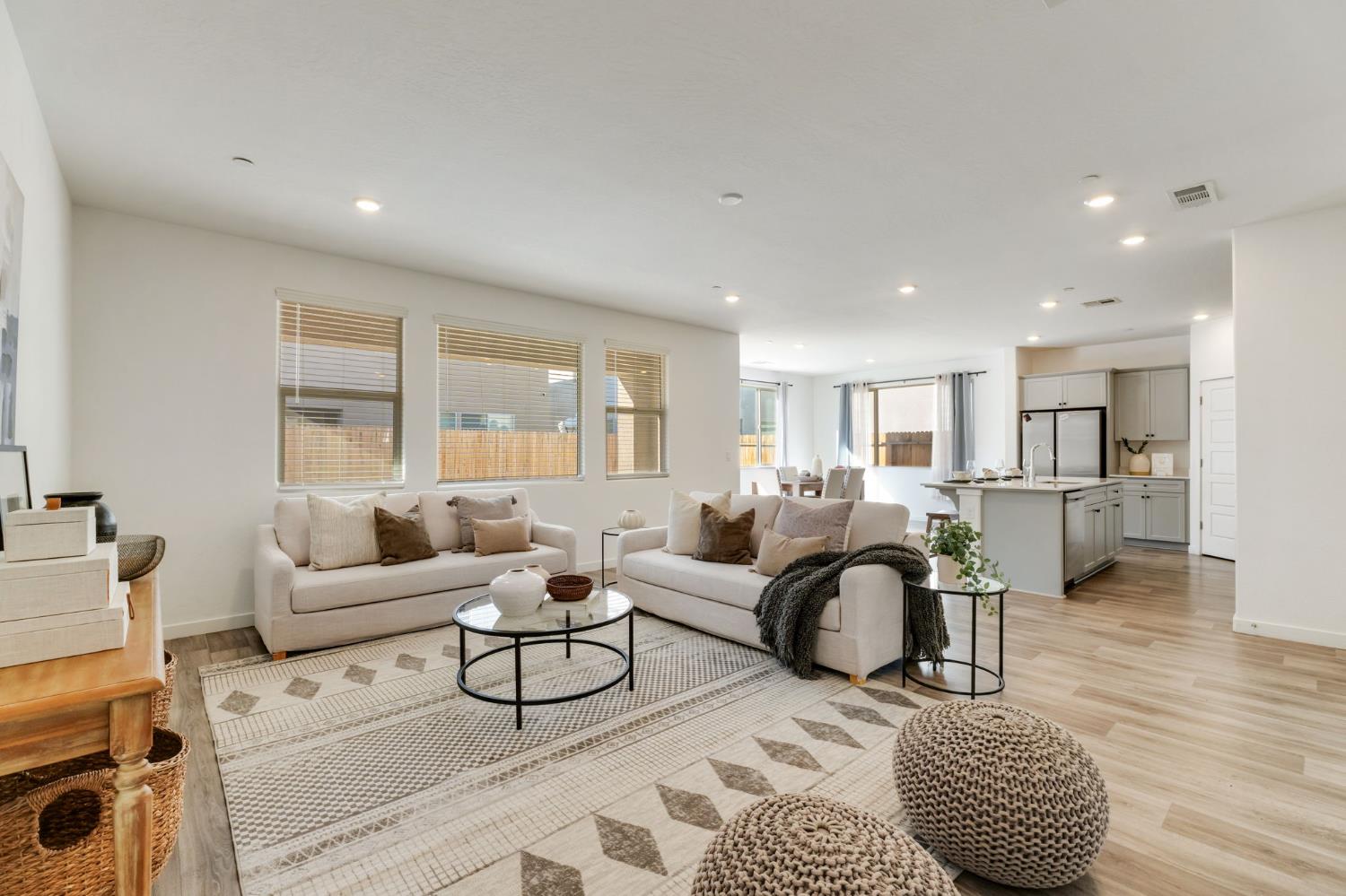 2819 North Redda Road Fresno, CA 93737 - Photo 11 of 57 a living room with furniture and a large window