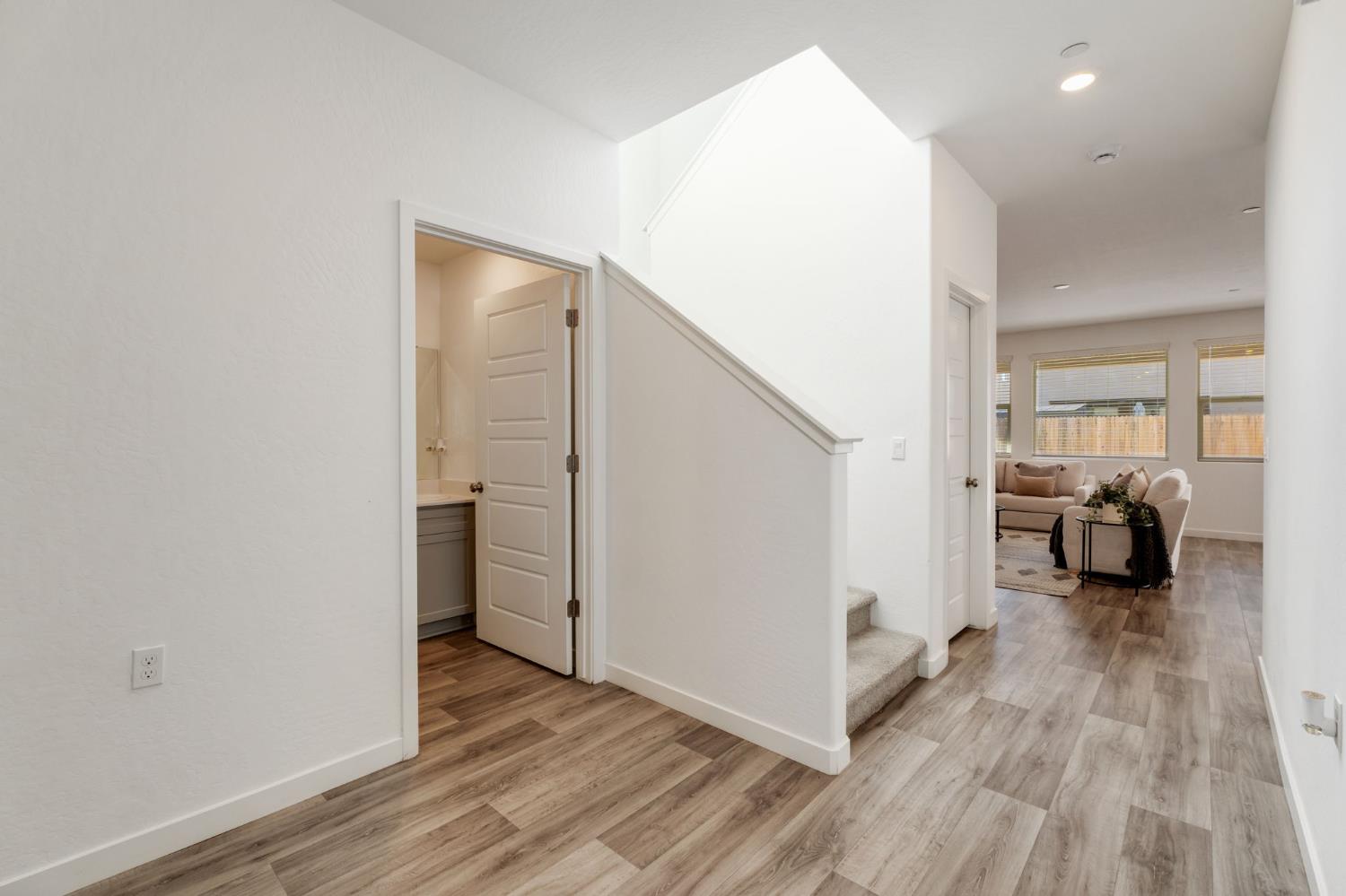 2819 North Redda Road Fresno, CA 93737 - Photo 6 of 57 a view of a livingroom with a walk in closet with wooden floor