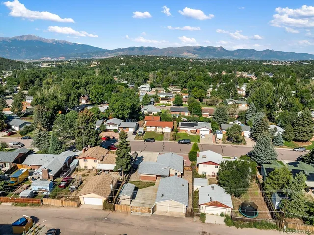 an aerial view of residential house with outdoor space