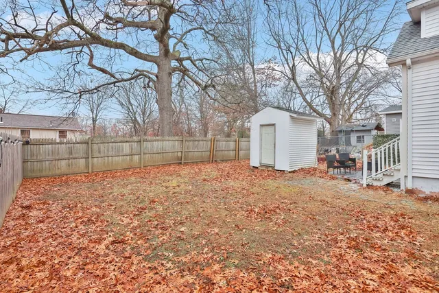 a view of backyard with trees