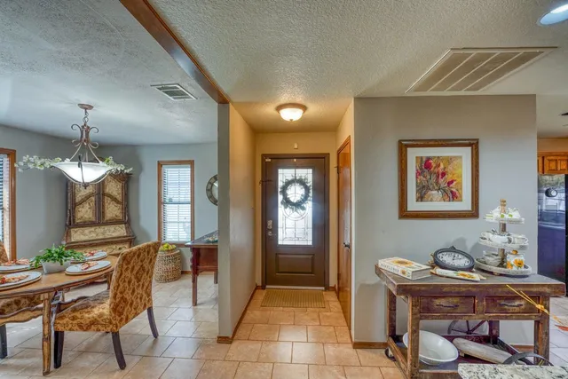a view of a livingroom with furniture and window