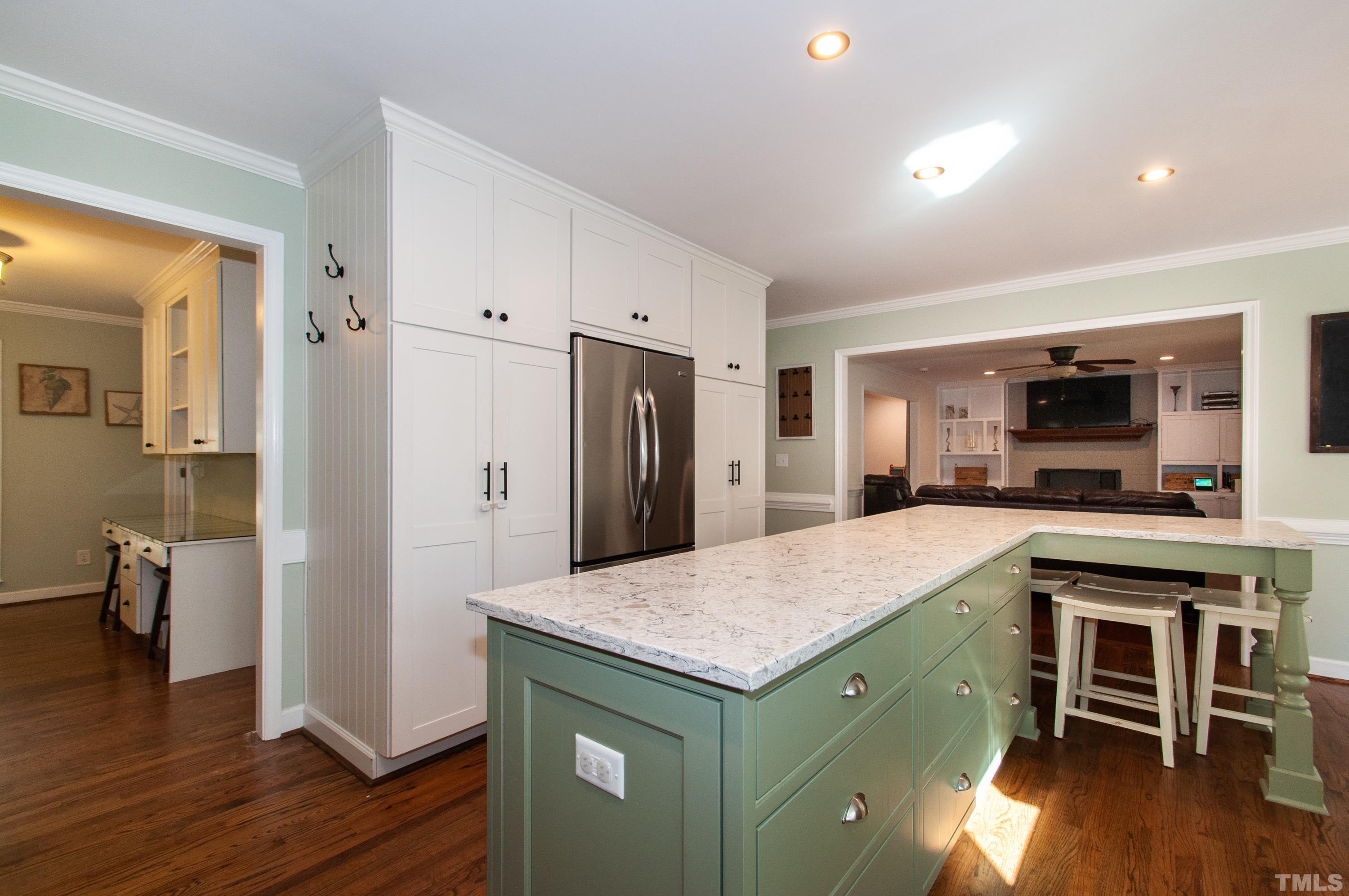 7901 Hepworth Court Raleigh, NC 27615 - Photo 11 of 30 a kitchen with stainless steel appliances granite countertop a refrigerator and a stove top oven