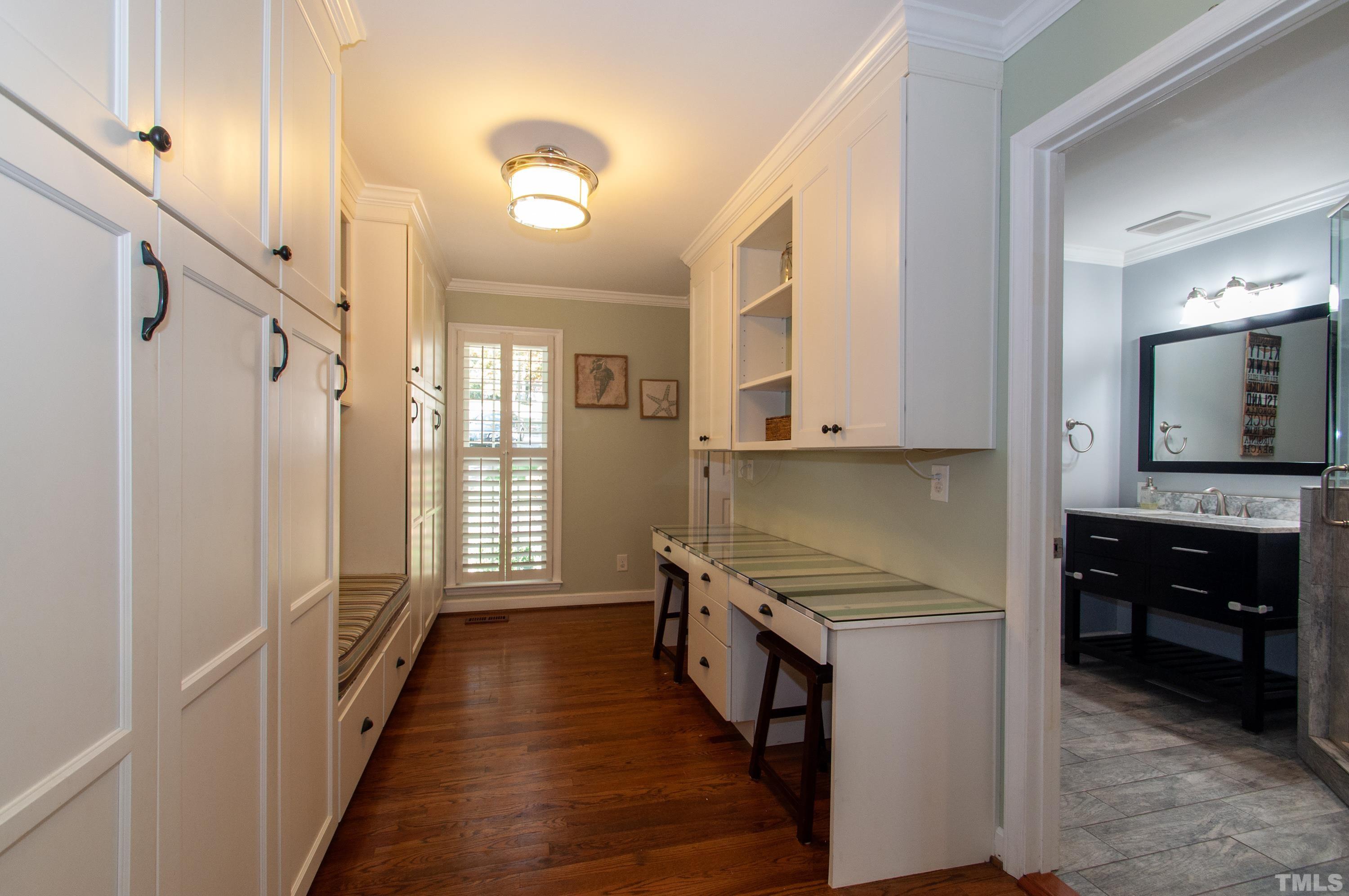 7901 Hepworth Court Raleigh, NC 27615 - Photo 12 of 30 a kitchen with granite countertop a stove and a refrigerator