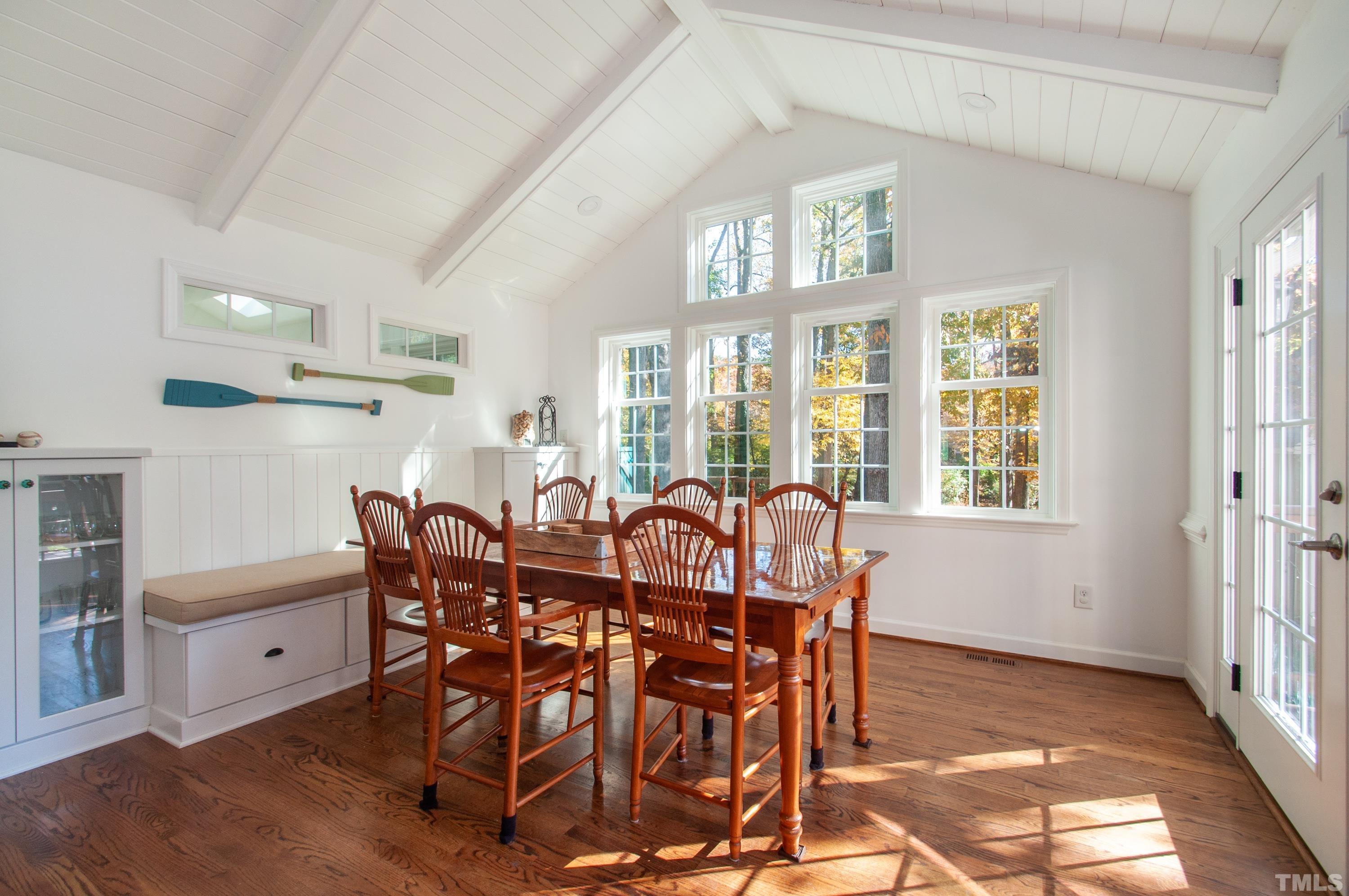 7901 Hepworth Court Raleigh, NC 27615 - Photo 14 of 30 a view of a dining room with furniture and windows