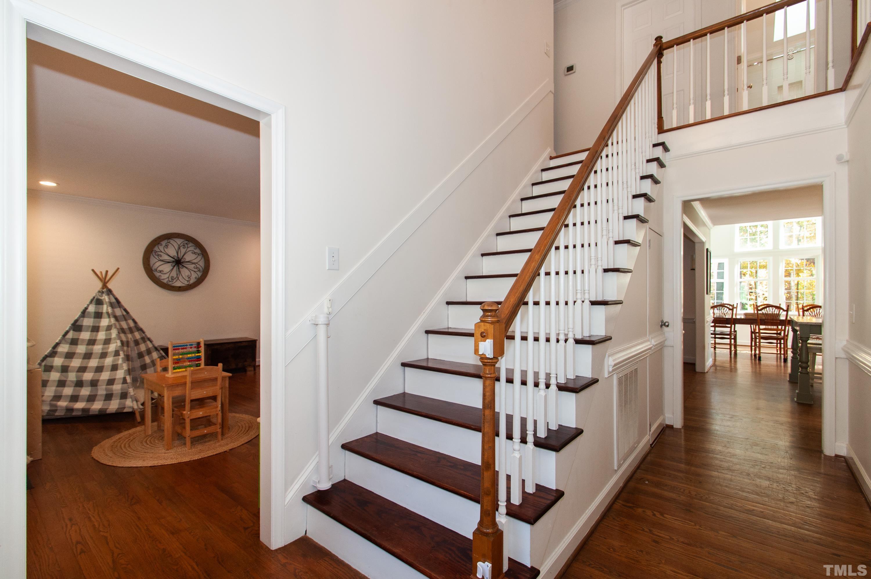 7901 Hepworth Court Raleigh, NC 27615 - Photo 2 of 30 a view of entryway with wooden floor