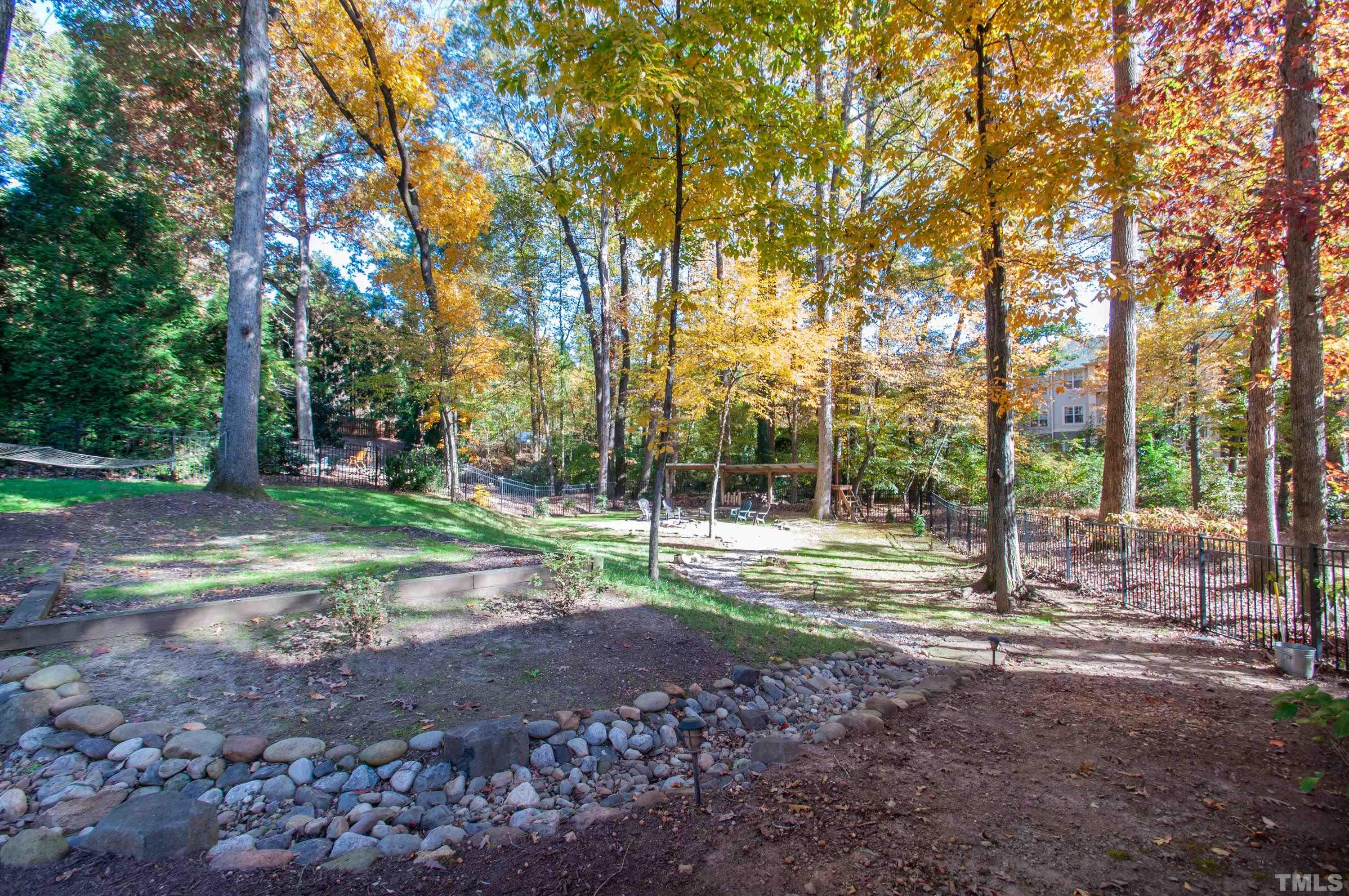 7901 Hepworth Court Raleigh, NC 27615 - Photo 26 of 30 a view of outdoor space with trees