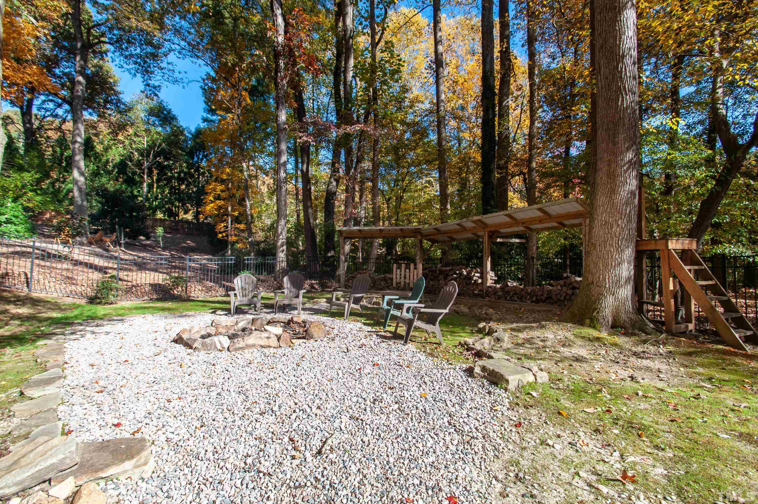 7901 Hepworth Court Raleigh, NC 27615 - Photo 27 of 30 a view of backyard with a table and chairs