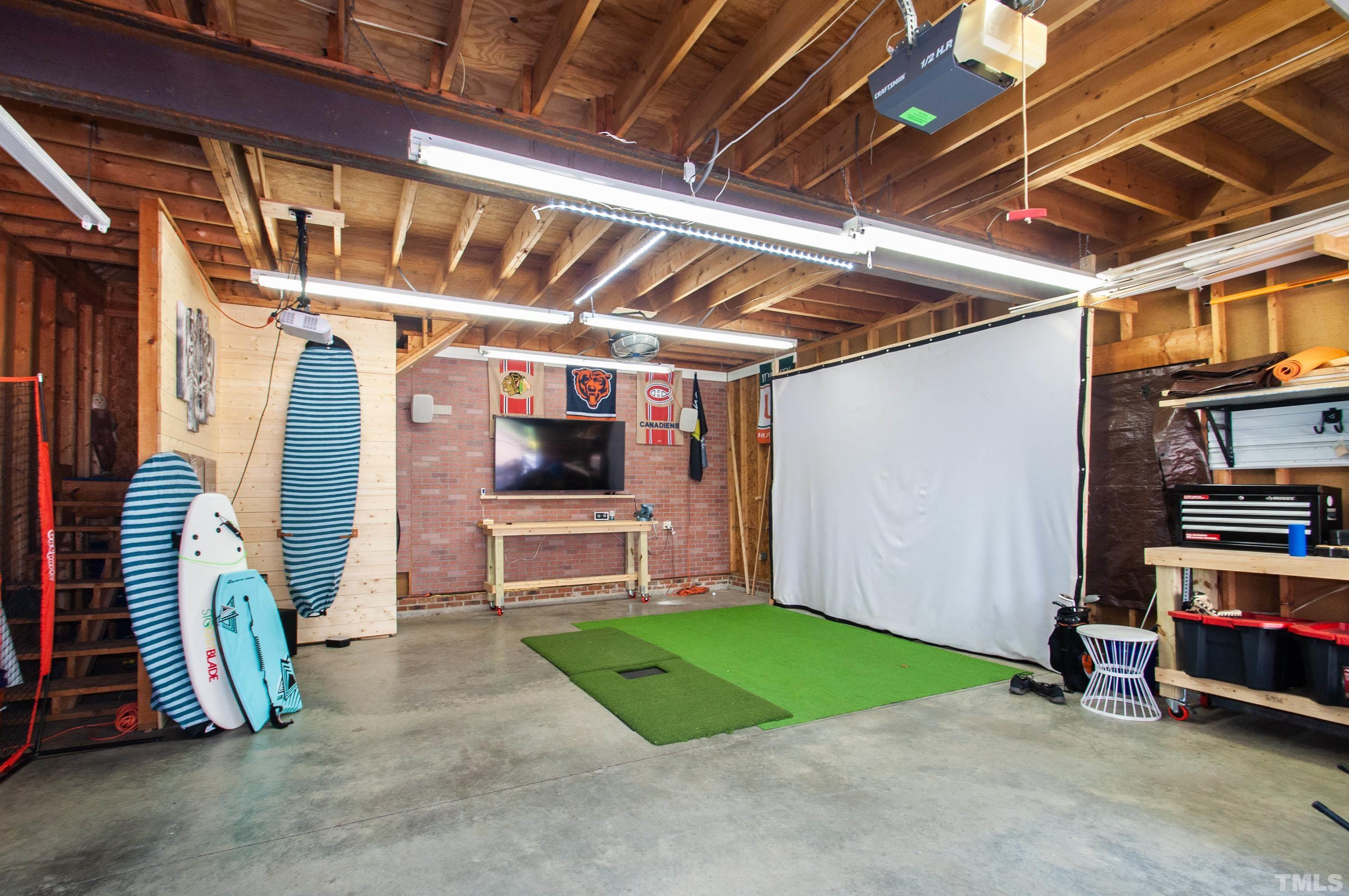 7901 Hepworth Court Raleigh, NC 27615 - Photo 29 of 30 a view of a garage with furniture