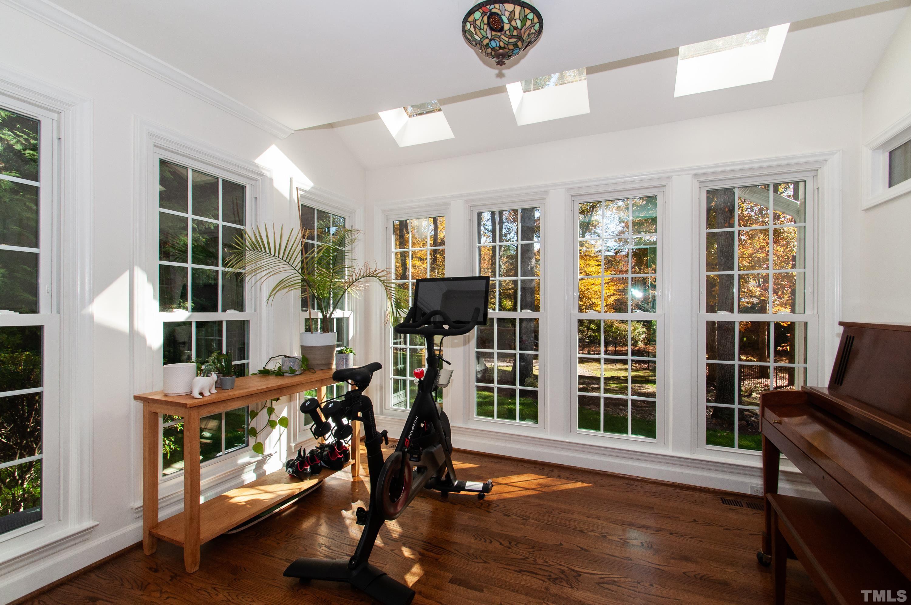 7901 Hepworth Court Raleigh, NC 27615 - Photo 7 of 30 a view of a room with gym equipment