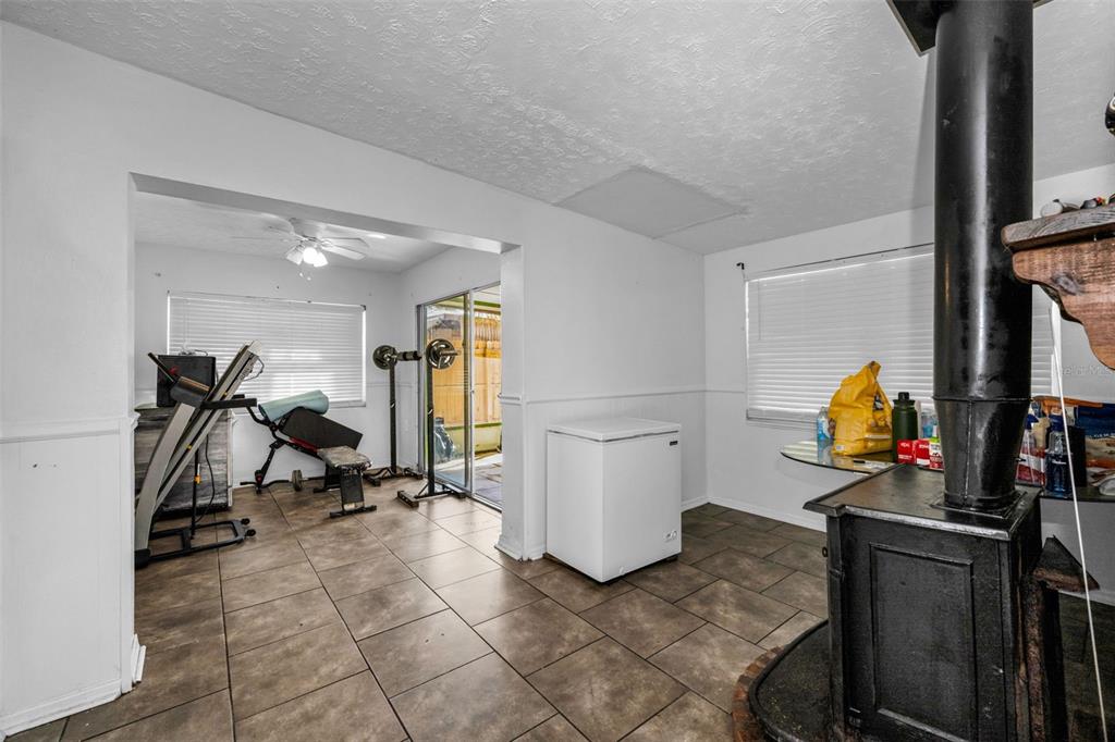 6126 Tennessee Avenue New Port Richey, FL 34653 - Photo 14 of 28 a view of a room with gym equipment