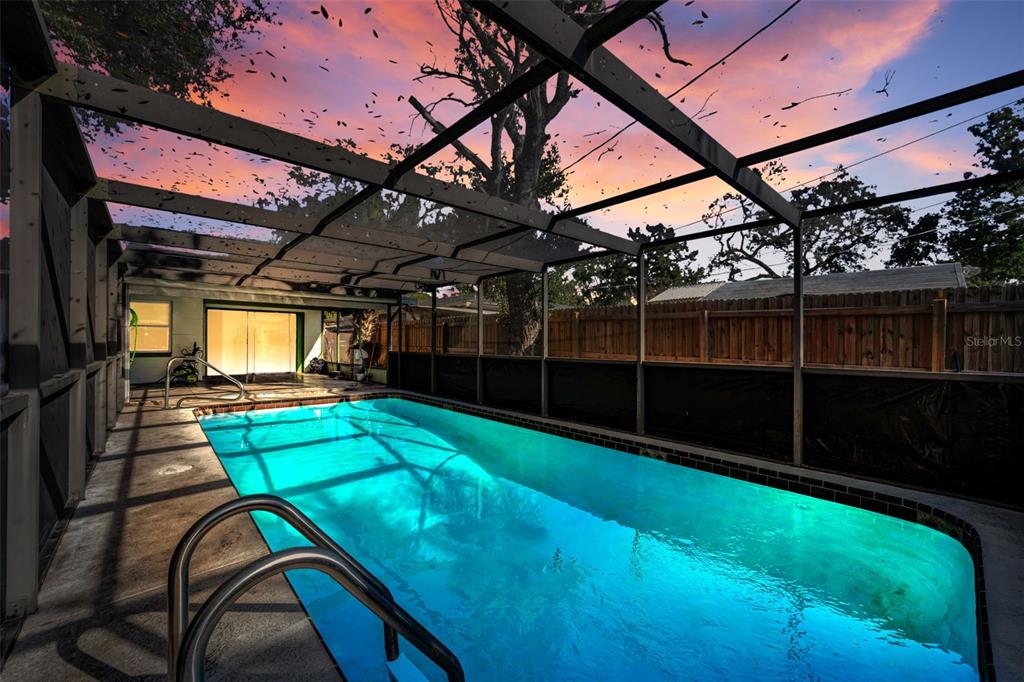 6126 Tennessee Avenue New Port Richey, FL 34653 - Photo 2 of 28 a view of a backyard with furniture