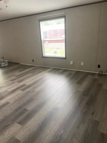 a house with trees in the background