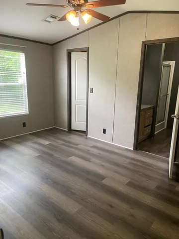 a bathroom with a toilet a sink and bathtub