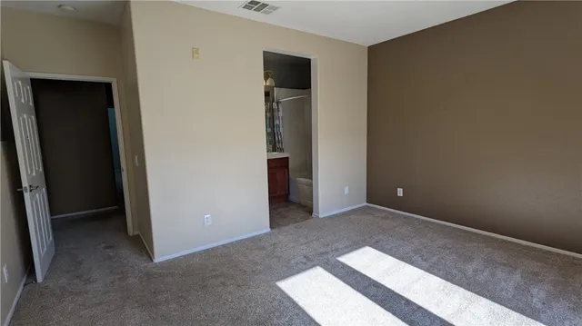 an empty room with closet