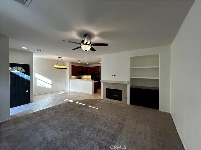 a view of a livingroom with a fireplace