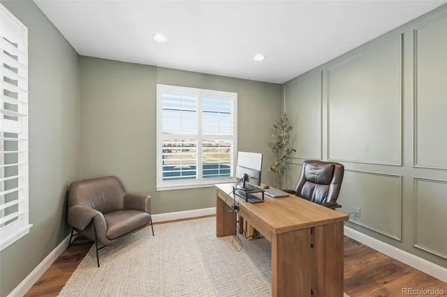 a bed room with a bed and a window