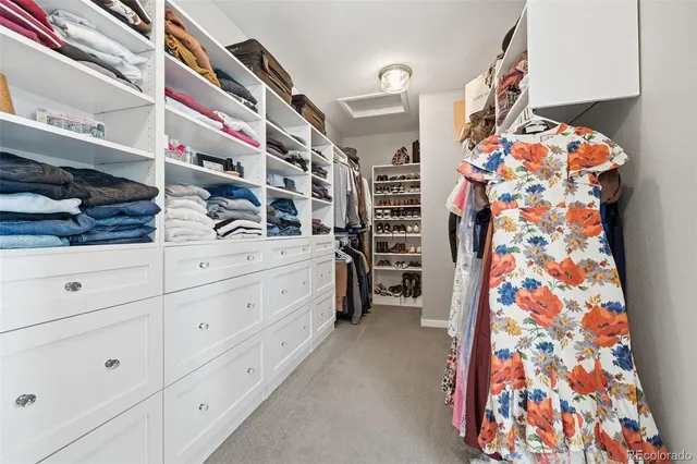 a bathroom with a sink a toilet and shower curtain