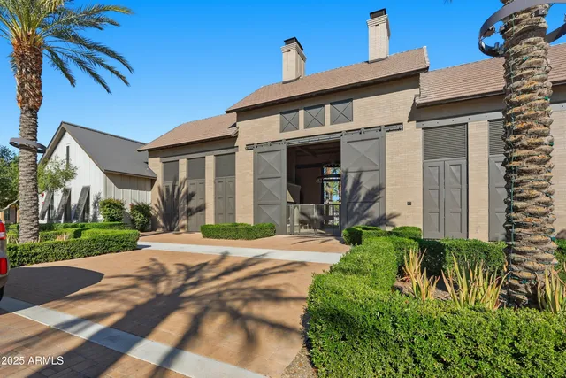 a view of a patio with couches chairs and a table